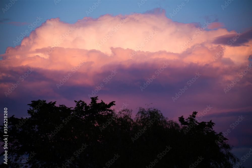 Beautiful magnificent clouds at sunset in the sky Beautiful magnificent clouds at sunset in the sky