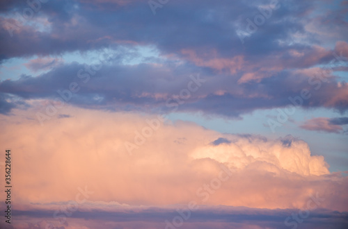 Beautiful magnificent clouds at sunset in the sky © Hennadii
