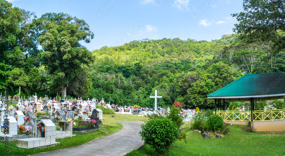 Multicolored tropical christian cemetery on La Digue island, Seychelles Multicolored tropical christian cemetery on La Digue island, Seychelles