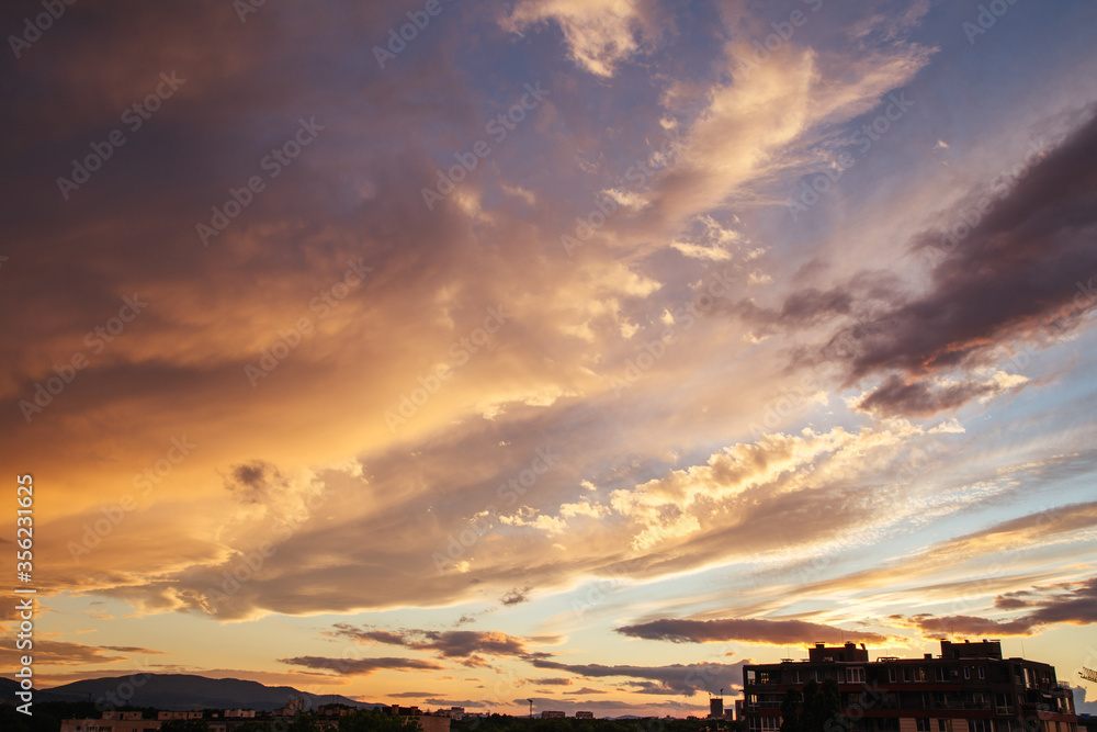 Cloudy sunset over the city of Sofia, Bulgaria. Warm colors sunset.
