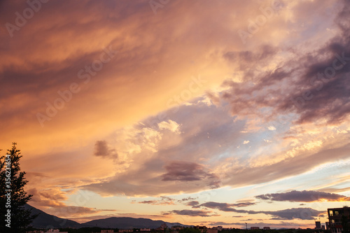 Cloudy sunset over the city of Sofia, Bulgaria. Warm colors sunset.