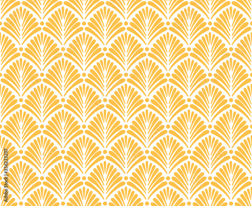 Art Deco inspired pattern with stylized palm leaf shape motif in golden yellow color. Elegant floral Art Deco seamless pattern.