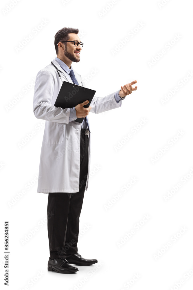Male doctor holding a clipboard and gesturing with hand Male doctor holding a clipboard and gesturing with hand