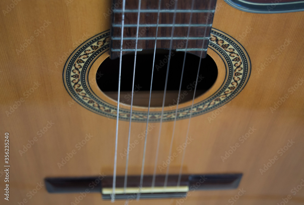 Obraz premium close in acoustic guitar