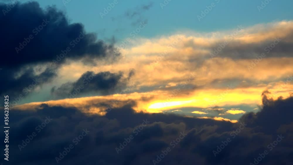 WS LA Fluffy clouds in sunset sky / Mettlach, Saarland, Germany WS LA Fluffy clouds in sunset sky / Mettlach, Saarland, Germany
