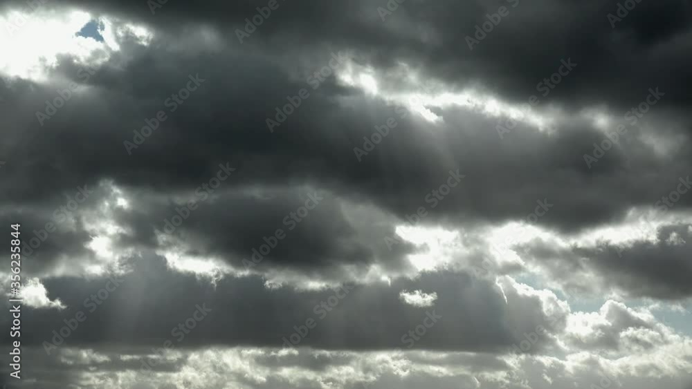 WS Sun shining through storm clouds / Kastel-Staadt, Rhineland-Palatinate, Germany WS Sun shining through storm clouds / Kastel-Staadt, Rhineland-Palatinate, Germany