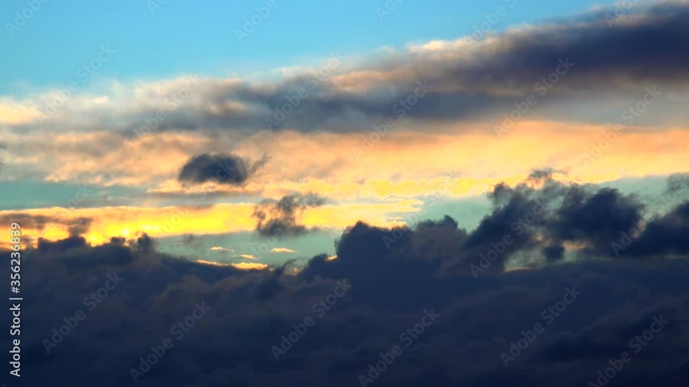 WS LA Fluffy clouds in sunset sky / Mettlach, Saarland, Germany WS LA Fluffy clouds in sunset sky / Mettlach, Saarland, Germany