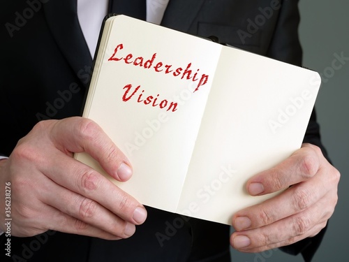 Business concept meaning Leadership Vision with inscription on the piece of paper.