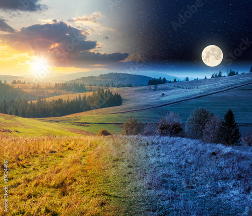 day and night time change concept above forest in red foliage. trees with branches with red foliage in forest. hillside in mountains with high peak in the distance with sun and moon © Pellinni
