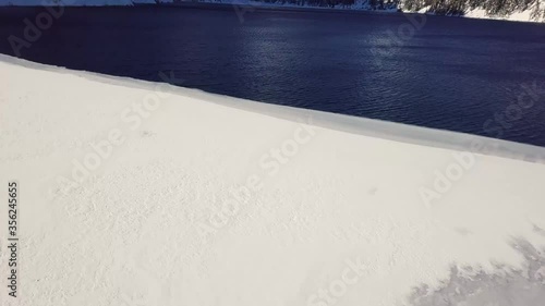 4K Winter aerial footage of Snow Lake in Washington State 
