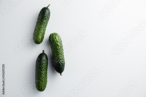 Cucumber on a white background. Minimum concept. Top view