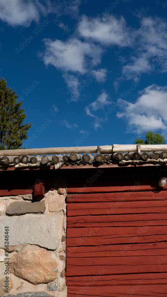 Gammelstad, Lulea, Swedish Lapland, Sweden, Europe. wooden, stone house on sky background