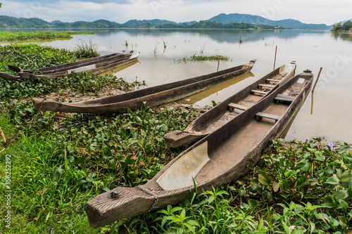 old fishing boat by the river in vietnam