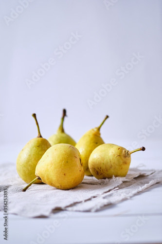Homemade village grandmother's pears on linen. Rural still life.