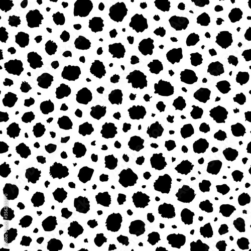 Background polka dot. Dalmation or leopard print. Seamless pattern dot. Random dots. Animal skin. Scattering dots for design fabric, wallpaper, prints. Scattered polkadots. Irregular circles. Vector