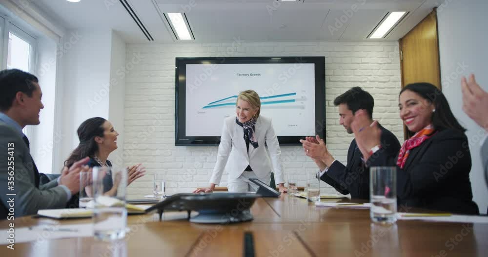 WS Business people clapping during meeting / Covent Garden, London, England, United Kingdom WS Business people clapping during meeting / Covent Garden, London, England, United Kingdom
