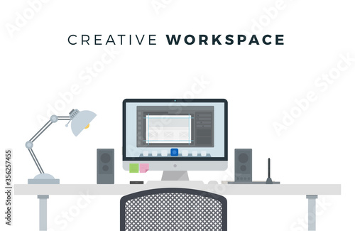 Minimalist work space with desk lamp, speakers, desktop on white background