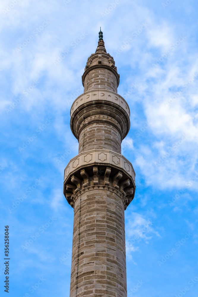 Süleyman-Pascha-Moschee Mosque Tower with blue sky and white clouds in background