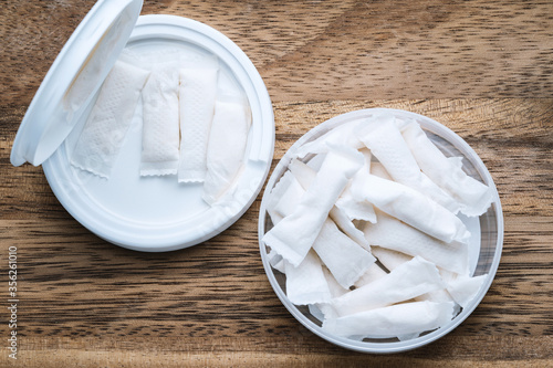 Box of swedish nicotine , snus on wood background