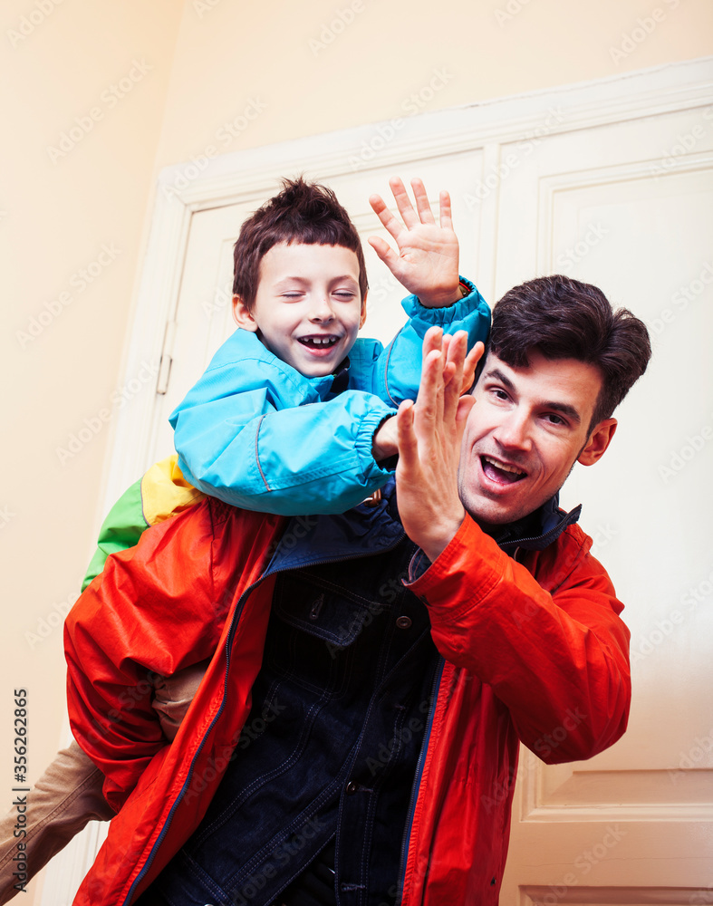 Fototapeta premium faher and son together having fun at home, lifestyle happy family, people at home