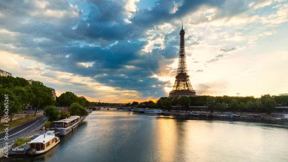 Eiffel Tower and reflections on Seine River at dawn Eiffel Tower and reflections on Seine River at dawn