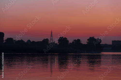 A sunset over a body of water