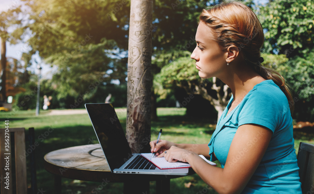 Gorgeous young woman is reading interesting book during her recreation time in summer weekend, Gorgeous young woman is reading interesting book during her recreation time in summer weekend,