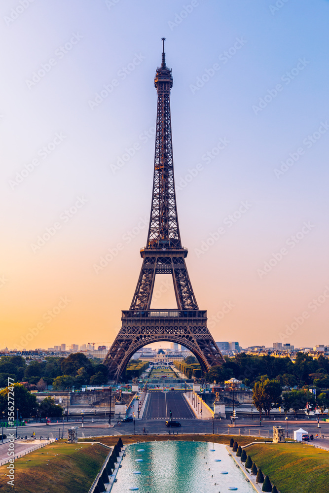 Eiffel tower in summer, Paris, France. Scenic panorama of the Eiffel tower under the blue sky. View of the Eiffel Tower in Paris, France in a beautiful summer day. Paris, France. - obrazy, fototapety, plakaty 