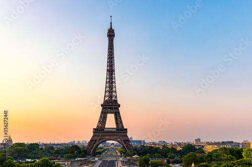 Eiffel tower in summer, Paris, France. Scenic panorama of the Eiffel tower under the blue sky. View of the Eiffel Tower in Paris, France in a beautiful summer day. Paris, France. © daliu