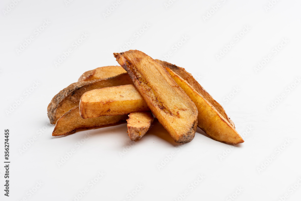rustic homemade french fries on white background portion os fries potato