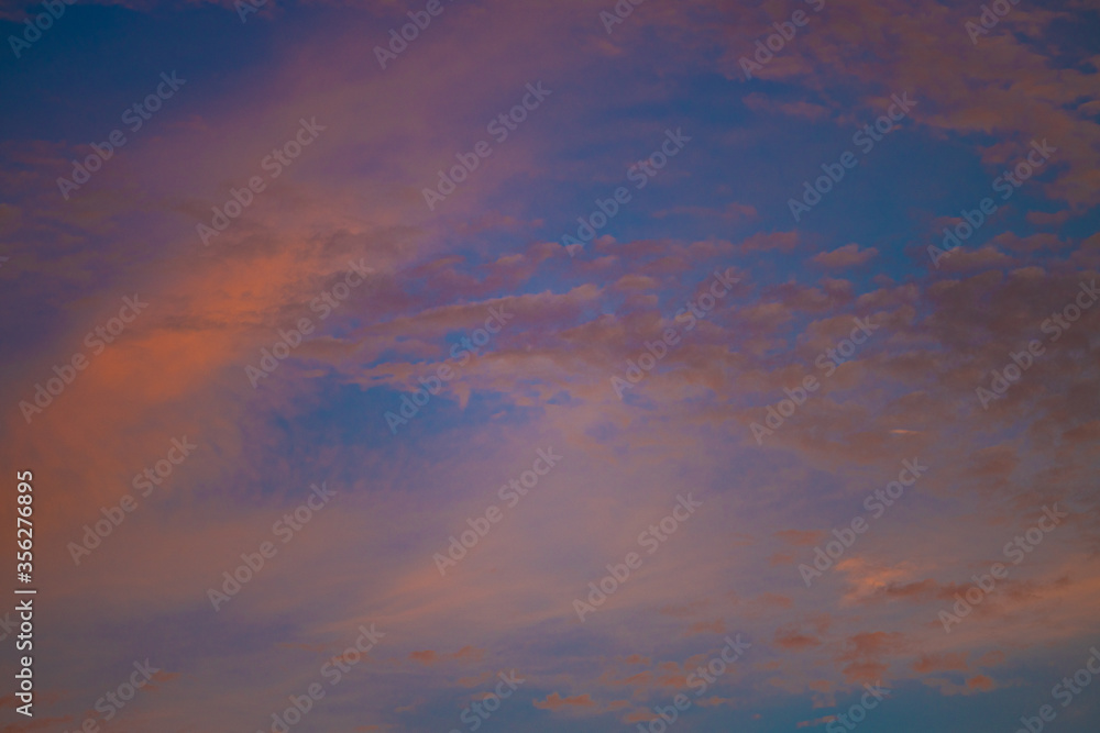 Obraz premium clouds NUBES COLORES evening