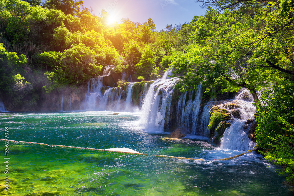 Beautiful Skradinski Buk Waterfall In Krka National Park, Dalmatia, Croatia, Europe. The magical waterfalls of Krka National Park, Split. An incredible place to visit near Split, Croatia. Beautiful Skradinski Buk Waterfall In Krka National Park, Dalmatia, Croatia, Europe. The magical waterfalls of Krka National Park, Split. An incredible place to visit near Split, Croatia.