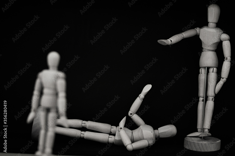 wooden mannequin standing on black background point to the face wooden mannequin standing on black background point to the face