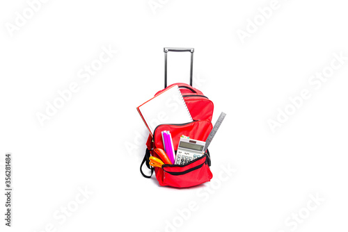 Red   Purple  Backpack with school supplies  isolated on white background.
