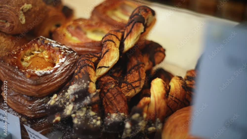 High angle close up of a selection of pastries at a bakery on Norwich market, England. High angle close up of a selection of pastries at a bakery on Norwich market, England.