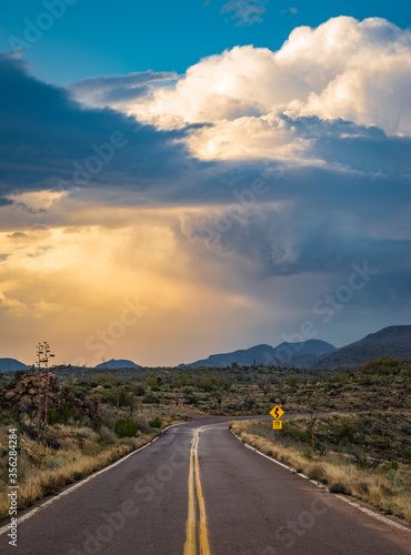 Sunset thunderstorm clouds along the Apache Trail in Arizona photo