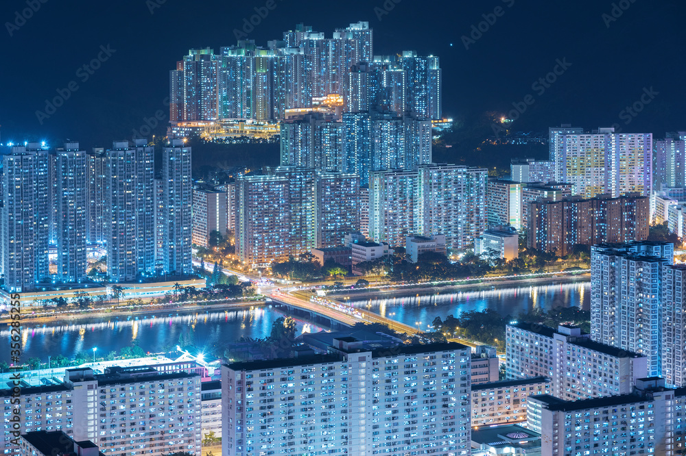 Fototapeta premium Aerial view of residential district of Hong Kong city at night