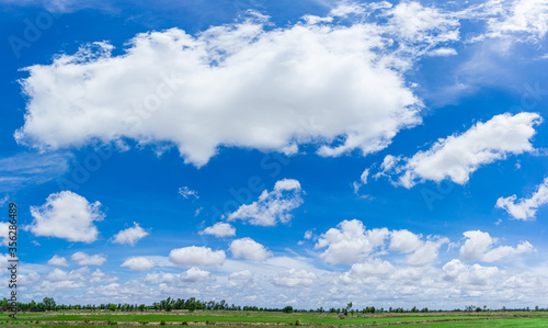 Panorama blue sky and clouds with field and daylight natural background.