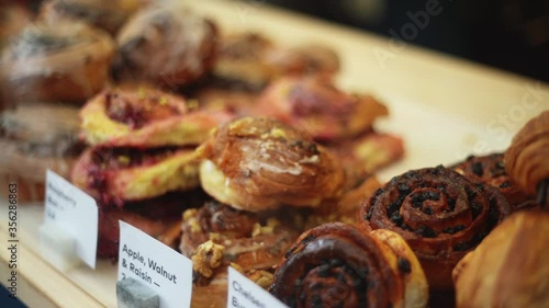 High angle close up of a selection of pastries at a bakery on Norwich market, England.
