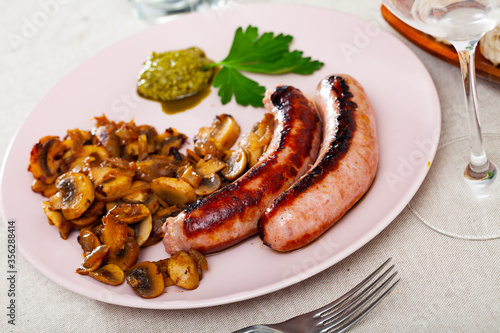 Grilled sausages with mushrooms