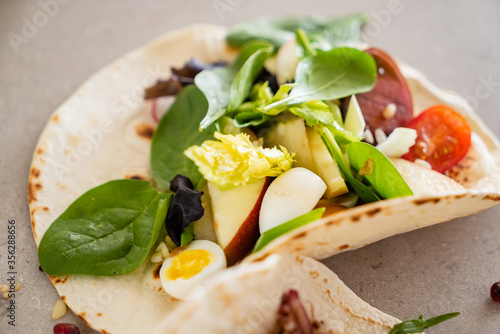 pita bread with fresh vegetables and dressing