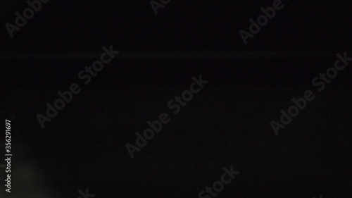 Flash light from window view of moving train in tunnel with motion blur . Video for mass transportation, travel and city life concept.