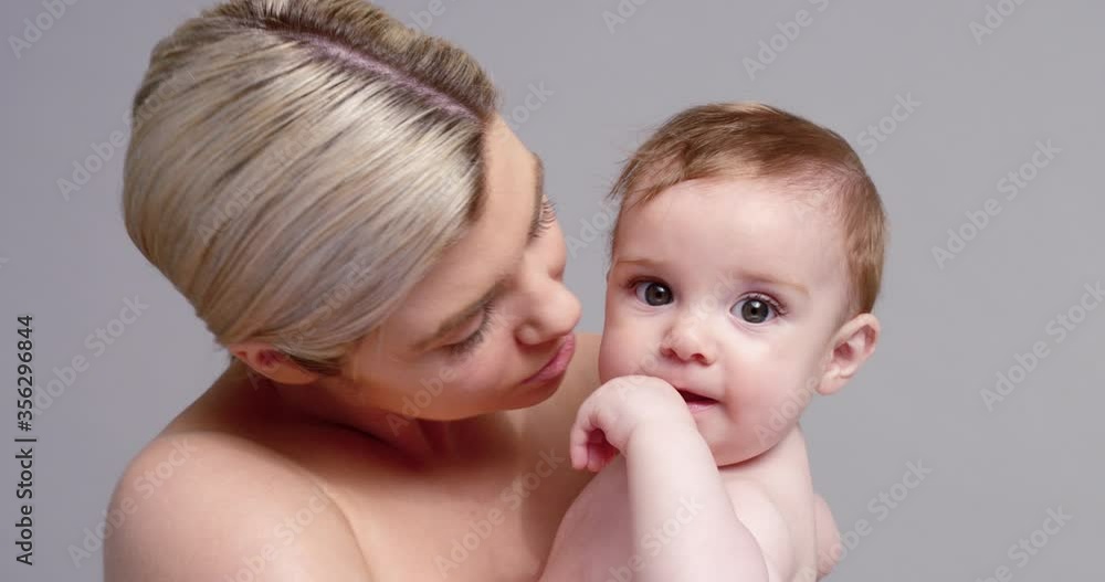 SLO MO CU ZO Young mother kissing baby son (6-11 months) SLO MO CU ZO Young mother kissing baby son (6-11 months)