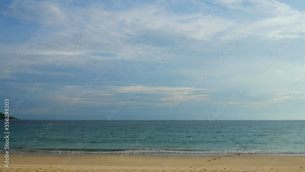 moving water wave hit sand shore coast, nobody on beach, skyline horizon beautiful cloudy blue sky background at day time, nature and travel concept moving water wave hit sand shore coast, nobody on beach, skyline horizon beautiful cloudy blue sky background at day time, nature and travel concept