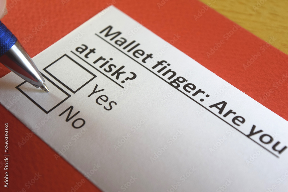 Fototapeta premium One person is answering question about mallet finger.
