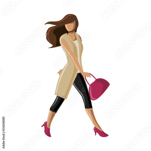 woman walking with handbag