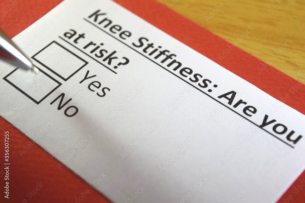 Fototapeta premium One person is answering question about knee stiffness.