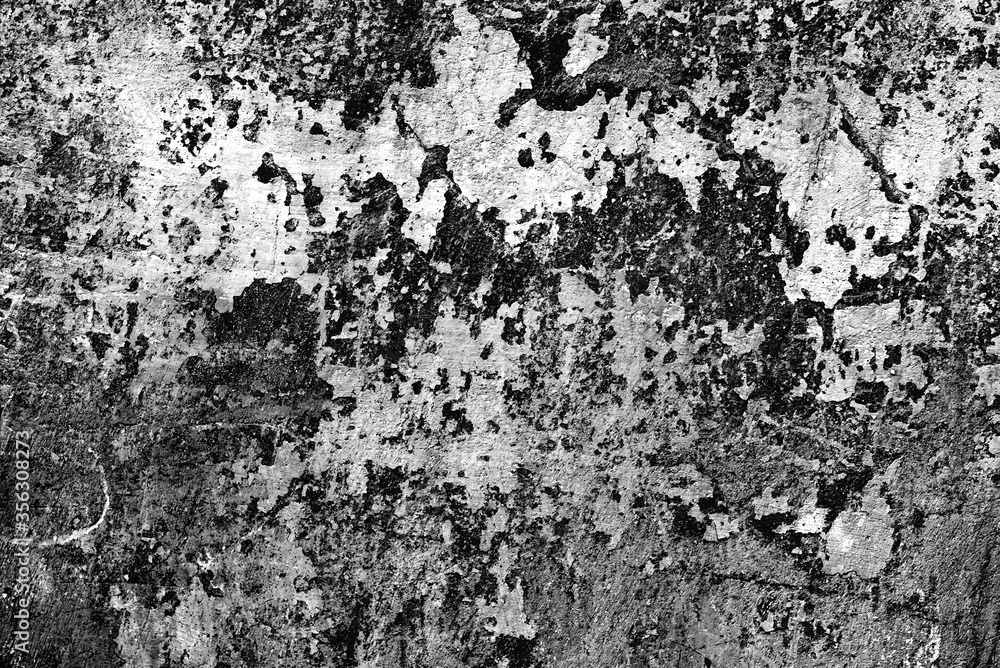 Texture of a concrete wall with cracks and scratches which can be used as a background Texture of a concrete wall with cracks and scratches which can be used as a background