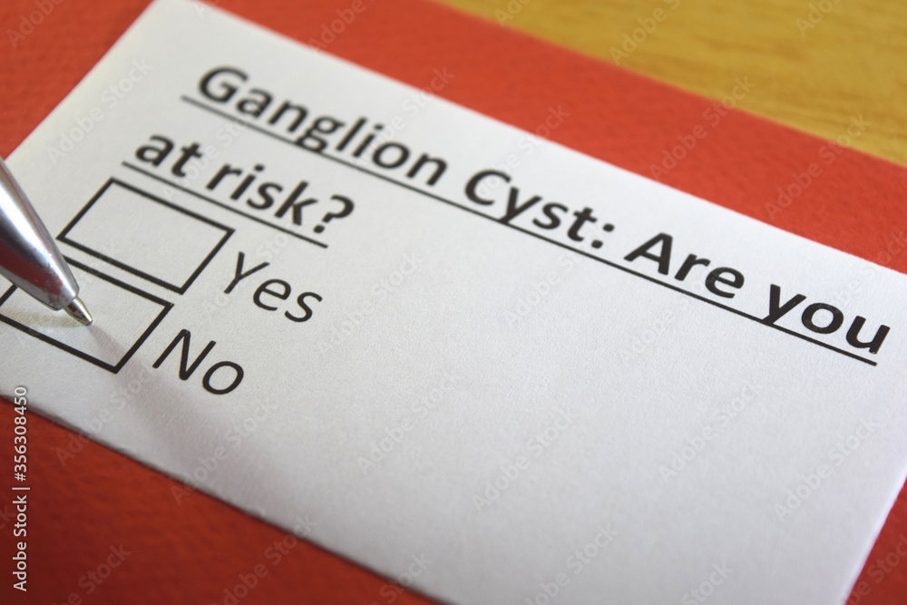Obraz premium One person is answering question about ganglion cyst.