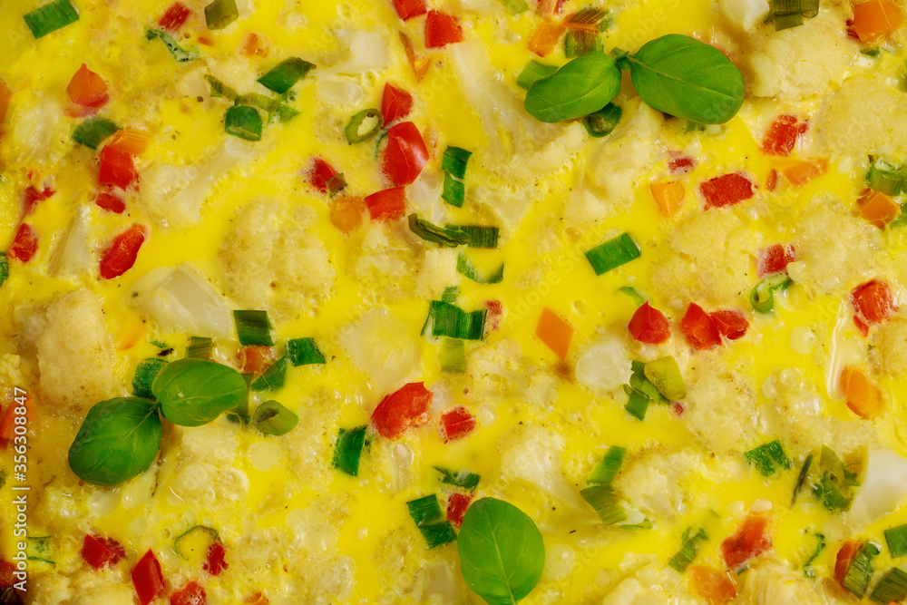 Scrambled eggs with chopped colorful vegetables. Scrambled eggs with chopped colorful vegetables.